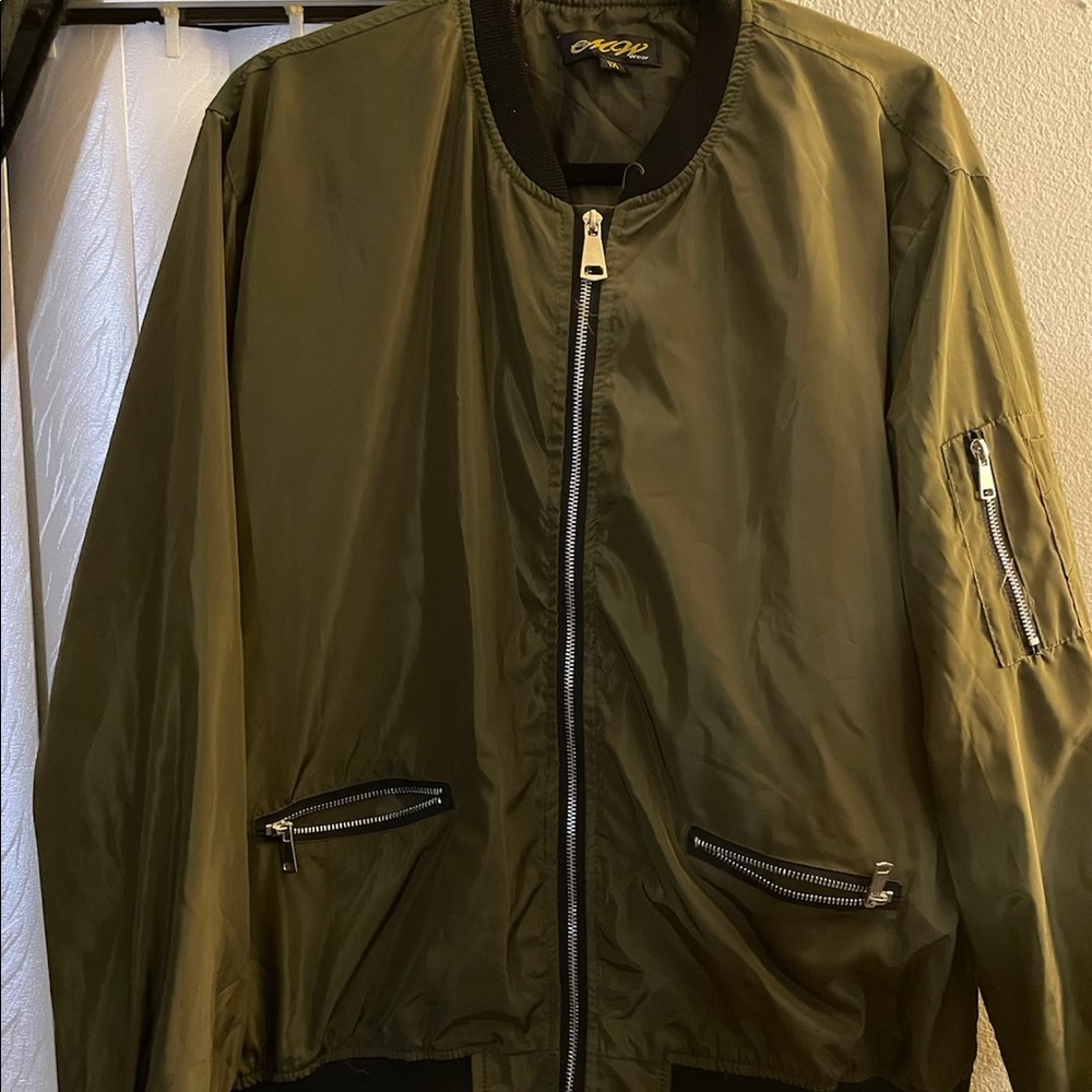 Zip up polyester varsity jacket.